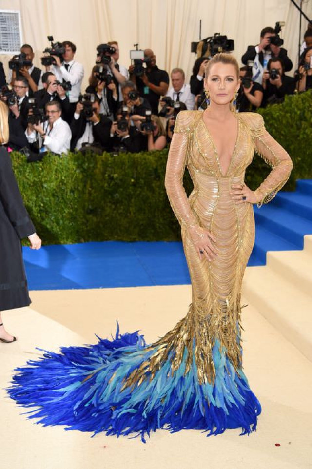 Blake Lively in a feathered tail Versace gown